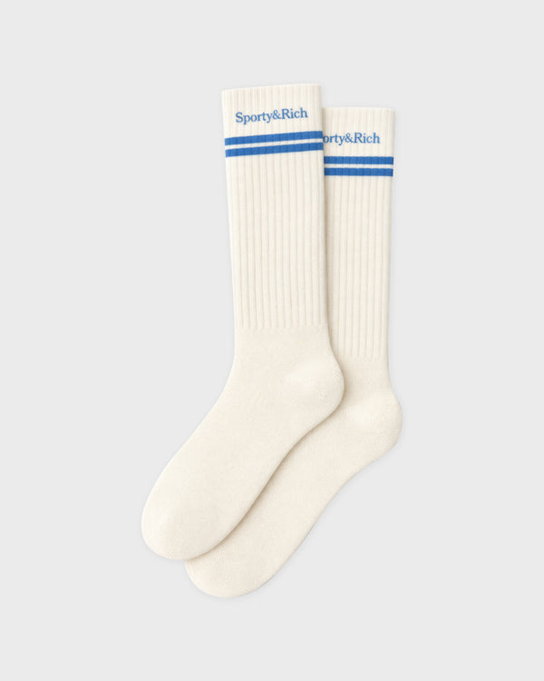Smooky Serif Logo Ski Socks in off-white ribbed knee-high style with blue stripes and logo text at the cuff.