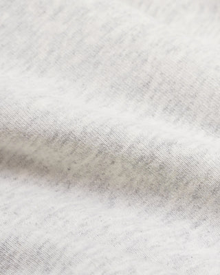 Close-up of a textured gray fabric with a subtle pattern