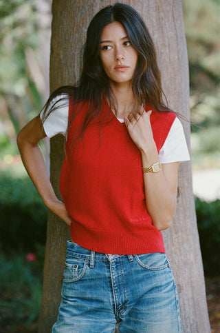Inao Signature Logo Cashmere Vest in Ruby, a sleeveless V-neck design in vibrant red cashmere, laid flat on a plain white background—ideal for stylish cold-weather layering.