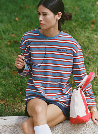 Fale Signature Logo Easy Longsleeve - Blue Red Striped features a relaxed fit with red, white, and blue horizontal stripes and a contrasting blue collar on a crisp white background. This easy longsleeve is the perfect layering piece for casual outfits.