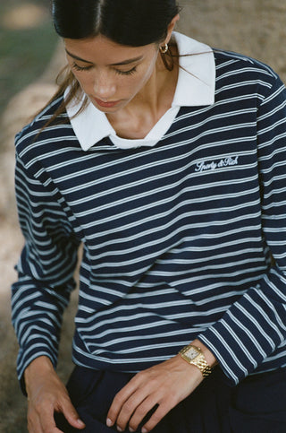 Introducing the Edgar Signature Logo Polo Top in Navy Stripe/White—a men’s relaxed fit polo featuring navy and white stripes, a classic white collar, and signature embroidered text on the chest, made from breathable cotton.