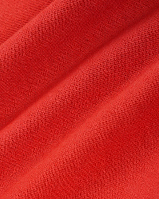 Close-up of red fabric with a textured surface