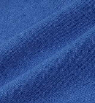 Close-up of blue fabric with a textured pattern