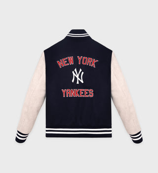 New York Yankees letterman jacket with white sleeves on a light gray background