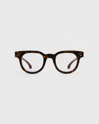 Frame N.04 - Blue Light Glasses - Tortoise, featuring round tortoiseshell frames and clear lenses, photographed on a plain white background.