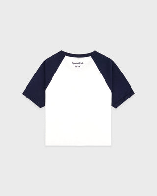 Dodgers Serif Baby Baseball Tee in White, Dark Navy, and Fire Red—crafted from 100% cotton, this stylish cropped raglan shirt features bold Dodgers text and a red LA logo on the front.