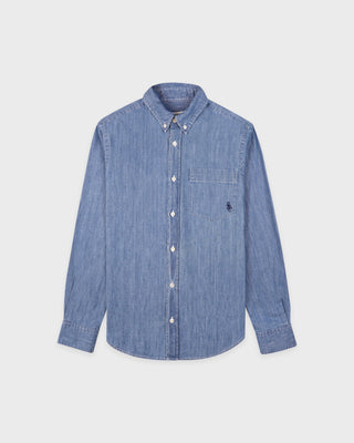 Blue denim shirt with a brand logo on a light gray background
