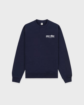 Navy blue sweatshirt with 'New York' text on a light gray background