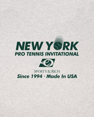 Gray sweatshirt with 'New York Pro Tennis Invitational' and 'Sporty & Rich' text on a light gray background