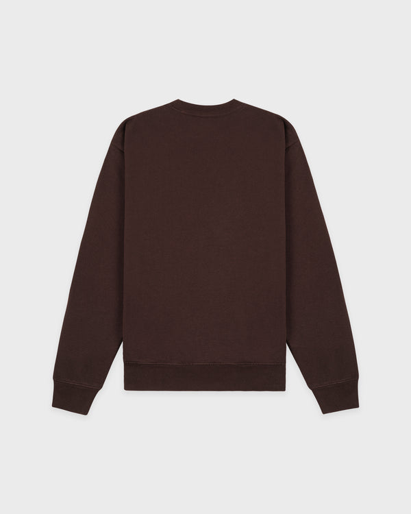 Brown sweatshirt on a light gray background