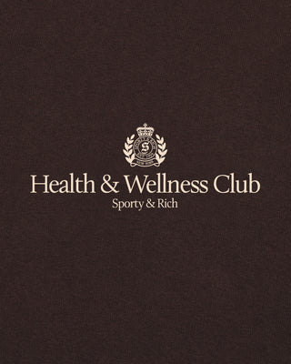 Logo of Health & Wellness Club on a dark background