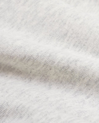 Close-up of a textured gray fabric with a subtle pattern