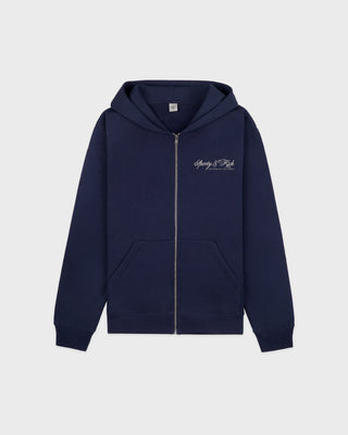 Navy blue hoodie with a brand logo on a light gray background