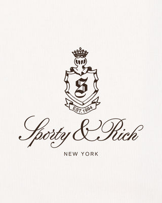 Sperry & Rich logo with crest and text on a white background