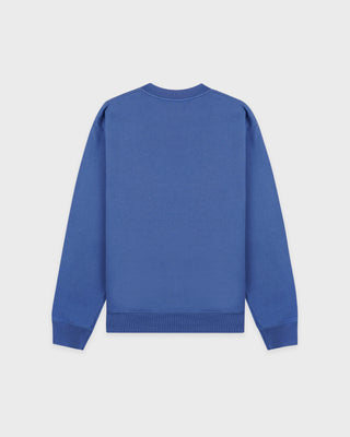 Blue sweatshirt on a light gray background
