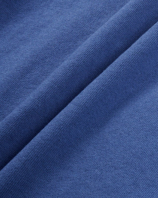 Close-up of blue fabric with folds