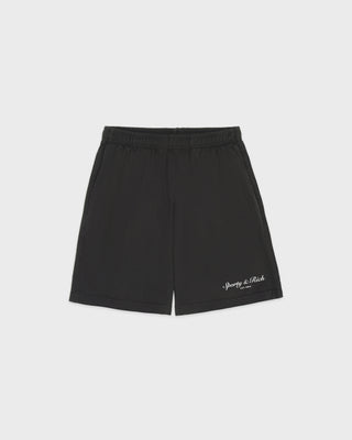 Black shorts with a brand logo on a light gray background