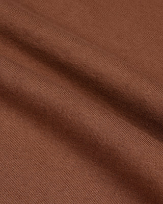 Close-up of brown fabric with visible texture