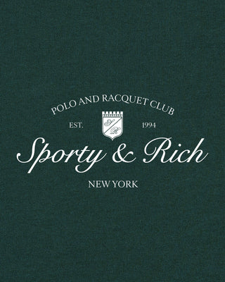 Sporty & Rich logo on a dark green background