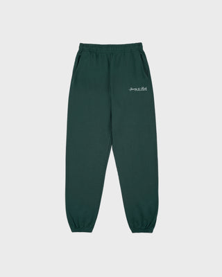 Green sweatpants with a brand logo on a white background