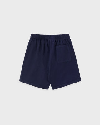 Navy blue shorts on a light gray background