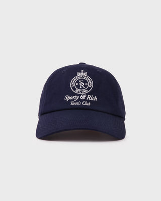 Navy blue cap with white logo and text on a light gray background