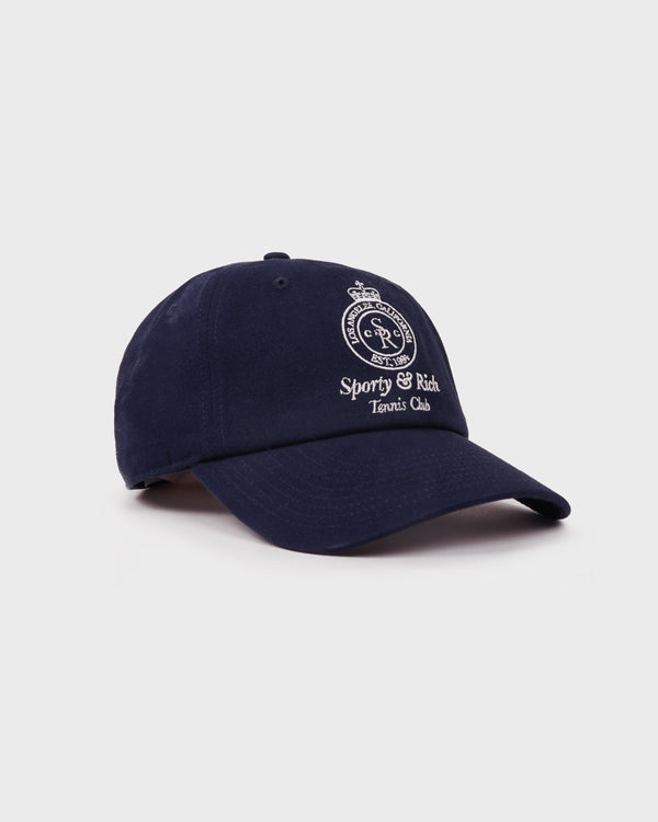 Navy blue cap with white text and logo on a light gray background