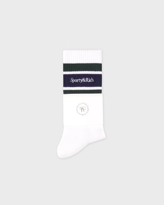 White sock with a black and purple striped band on a light gray background