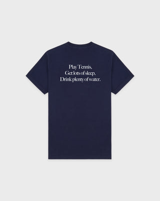 Navy blue t-shirt with white text on a light gray background