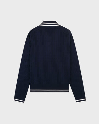 Navy ribbed sweater with striped collar on a light gray background