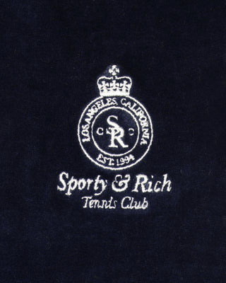 Logo of Sporty & Rich Tennis Club on a black background