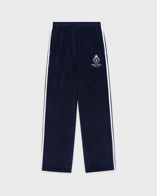Navy tracksuit pants with white stripes on a light gray background