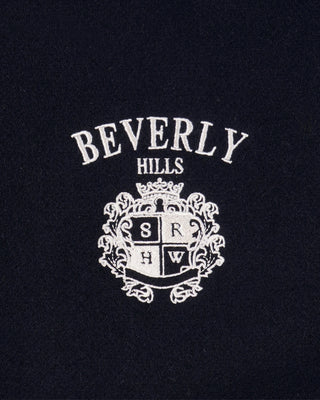White 'Beverly Hills' logo on a black background