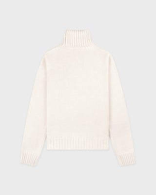 White sweater on a light gray background