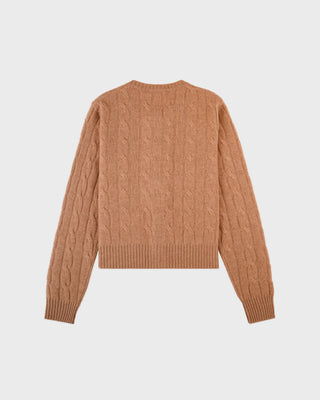Brown cable knit sweater on a light gray background