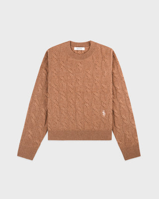 Brown cable knit sweater on a light gray background