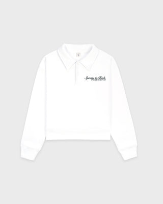 White long-sleeve polo shirt with text on a light gray background