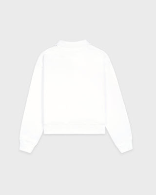 White long-sleeve top on a light gray background