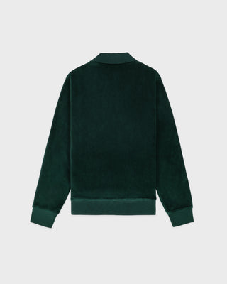 Green jacket on a light gray background