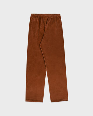 Brown corduroy pants on a light gray background
