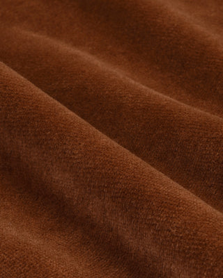 Close-up of brown fabric with a soft texture