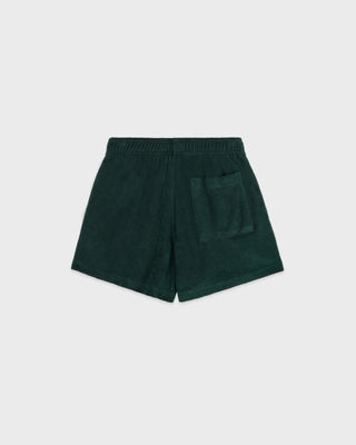 Green shorts on a light gray background