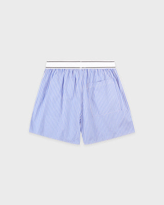 Blue and white striped shorts on a light gray background