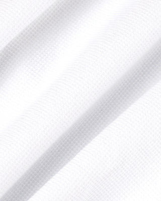 Close-up of a white textured fabric with diagonal lines