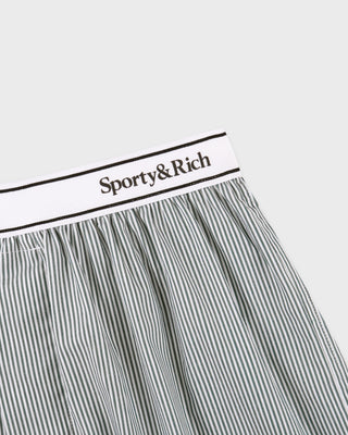 Striped underwear with 'Sporty&Rich' label on a light gray background