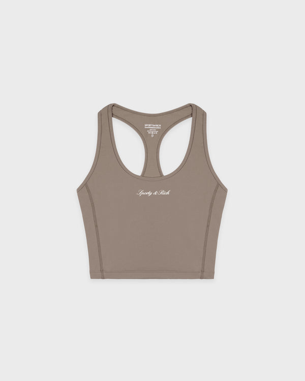 Signature Logo Sports Tank in Hazelnut featuring “Simply the Best” in white cursive on the front center, made from a soft nylon-spandex blend for a comfortable regular fit.