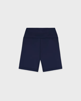 Navy blue shorts on a light gray background