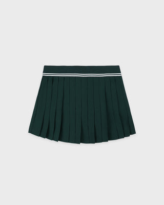 Green pleated skirt with a white waistband on a light gray background