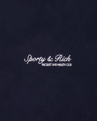 Navy blue fabric with 'Sporty & Rich' logo in white