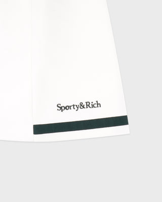 White product with 'Sporty&Rich' logo on a white background